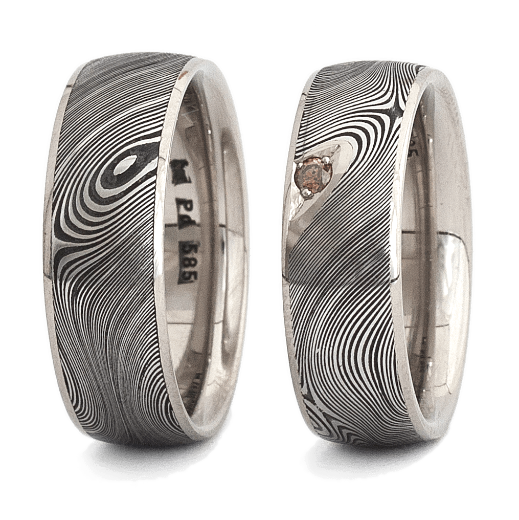 Trauringe Damaszenerstahl & Weißgold