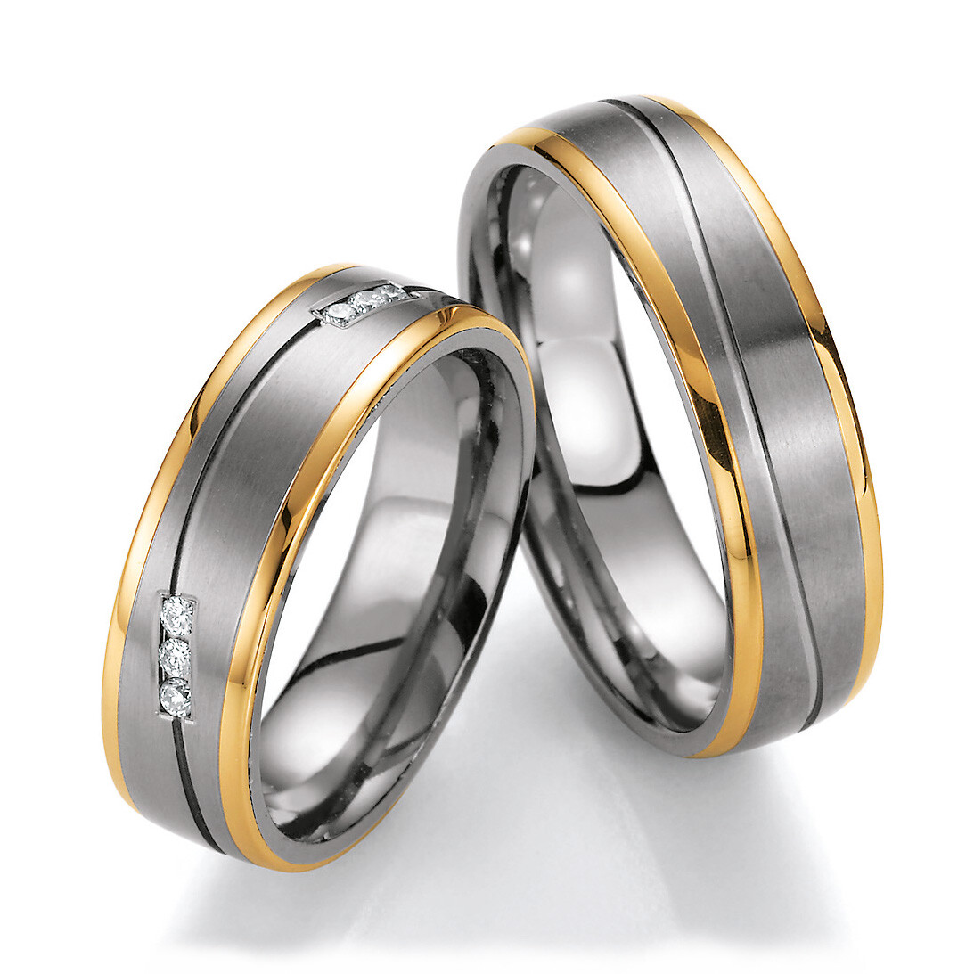 Trauringe 78/80010-060 & 78/80020-060 aus Gelbgold 585 & Titan